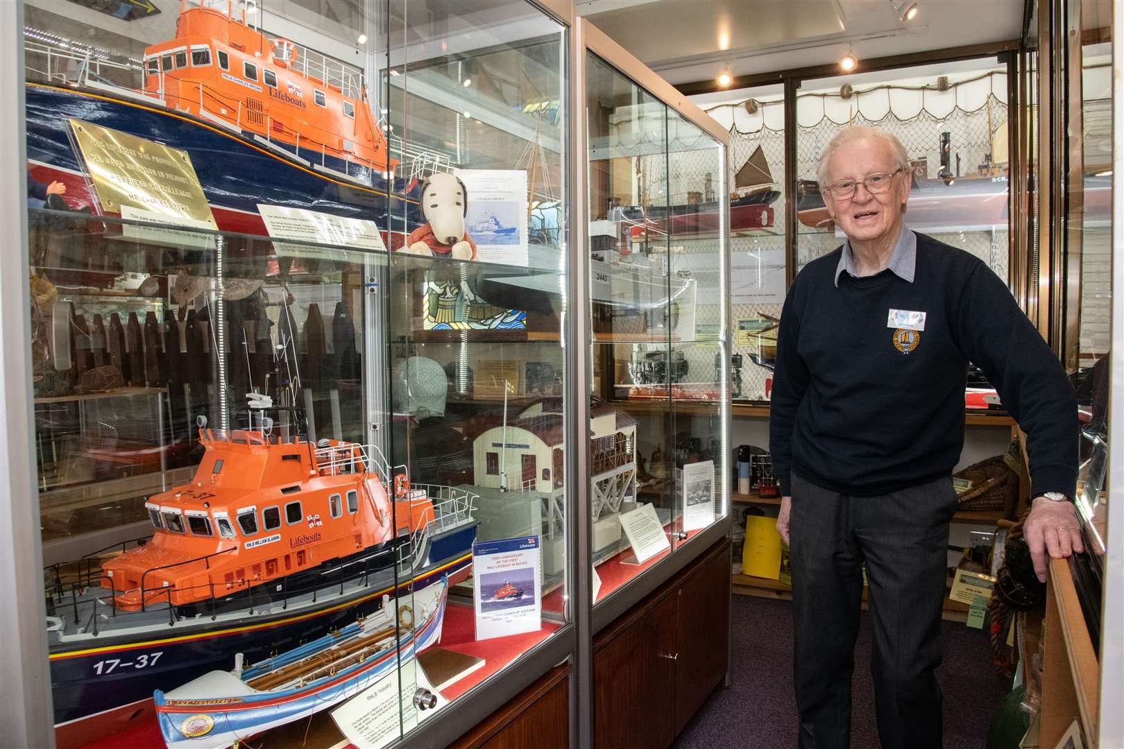 Centre chairman Jim Farquhar with models of Buckie's current and previous RNLI lifeboats. Picture: Daniel Forsyth