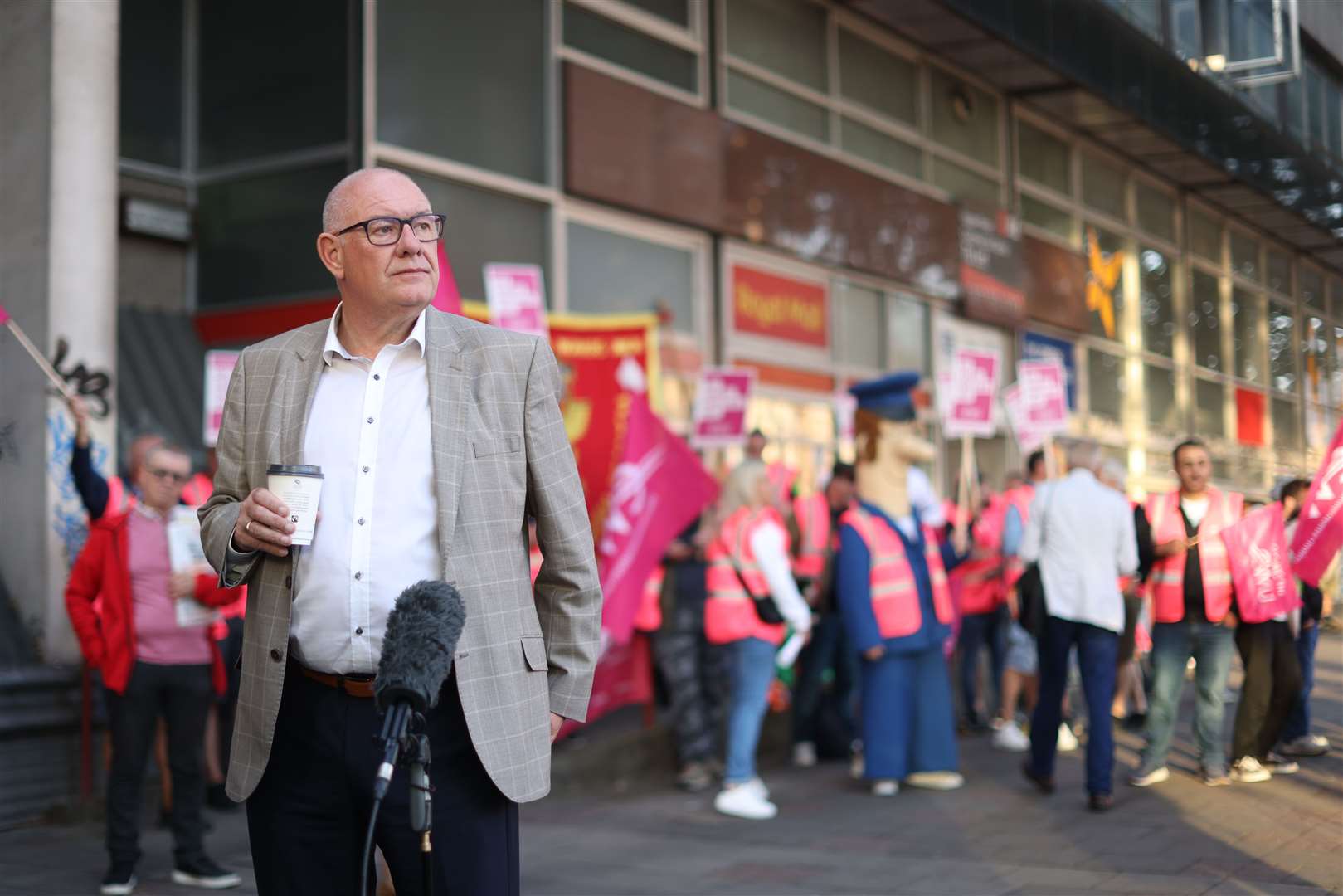 CWU general secretary Dave Ward speaking to the media as he joins postal workers on the picket line on Friday (James Manning/PA)