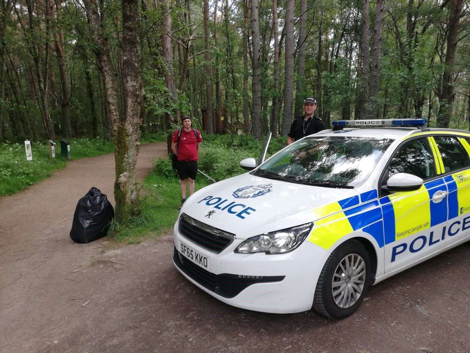 A CNPA ranger and an officer from Police Scotland on patrol at Glenmore.