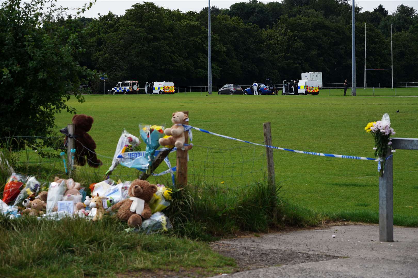 Tributes left at the scene in the Sarn area of Bridgend, South Wales, near to where five-year-old Logan Mwangi was found dead (Ben Birchall/PA)