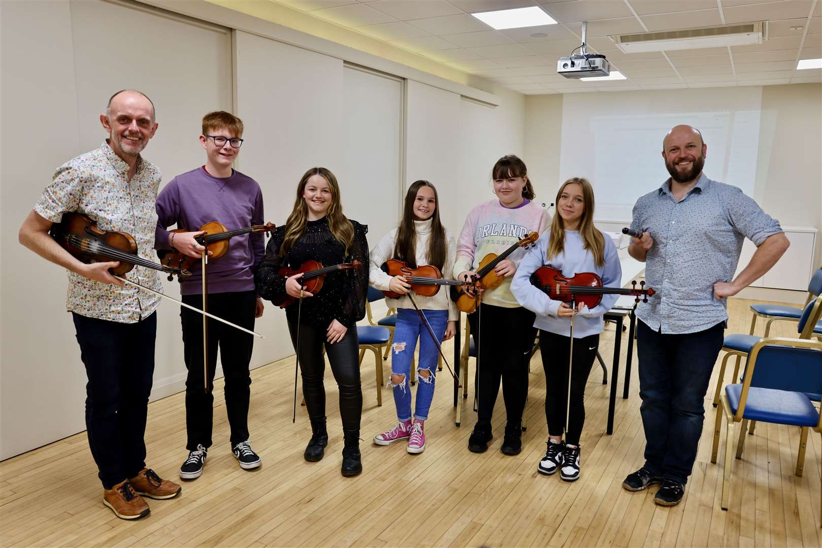 Duncan and Hamish with some students who took part in a compositional workshop. Picture: Graeme Roger