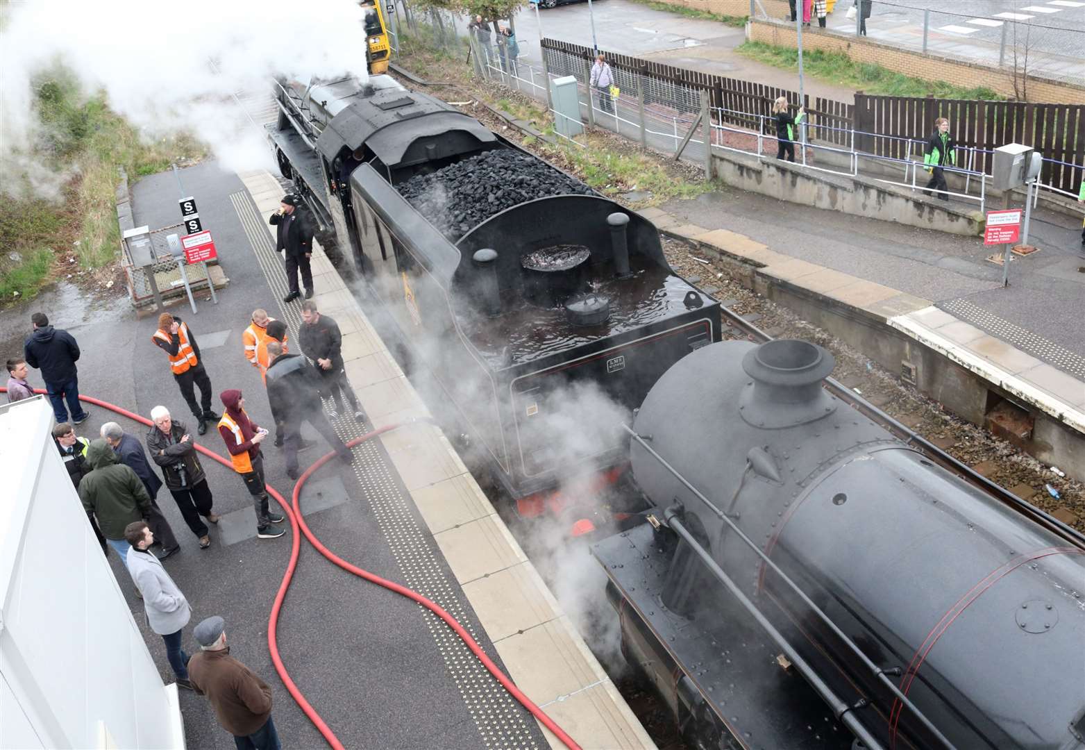 Great Britain XVI departs from Elgin station as it heads round the UK