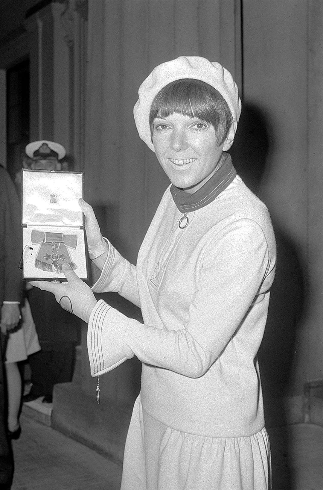Mary Quant at Buckingham Palace after receiving an OBE at her investiture (PA)