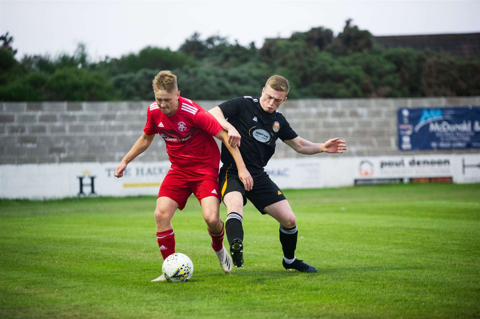 Ryan Sewell (left) netted Lossiemouth's opener against Fort William. Picture: Becky Saunderson..