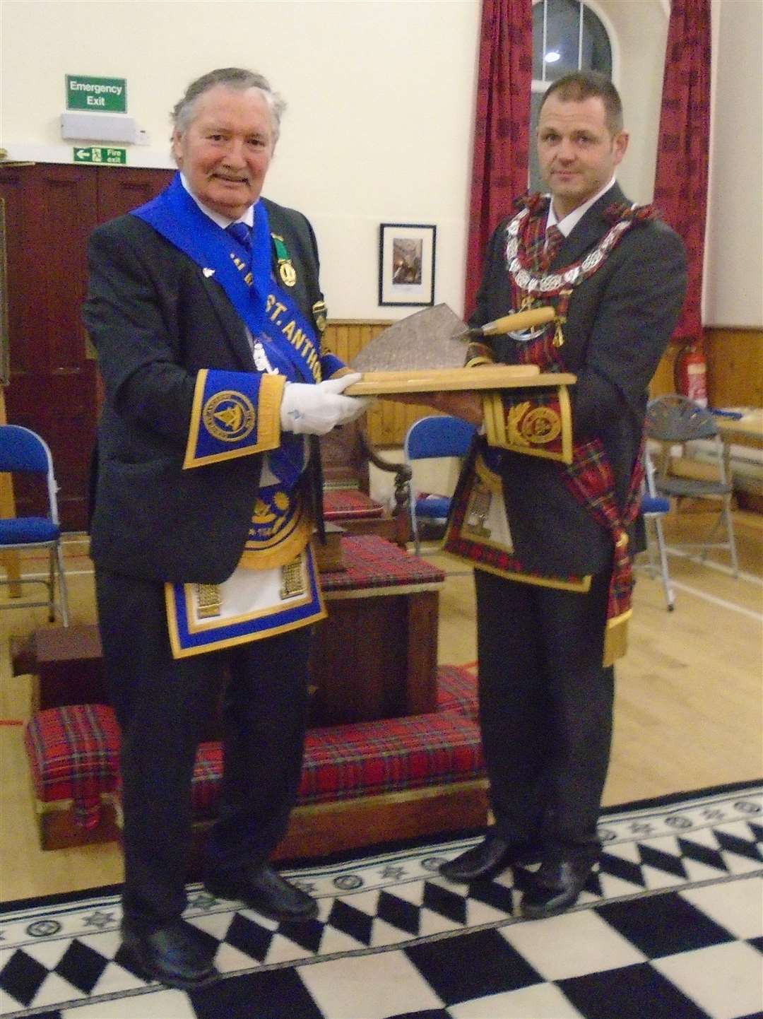Lodge St. Anthony No. 154 RWM Brian Morton receives the Travelling Trowel from Lodge Royal Braemar No. 1195.
