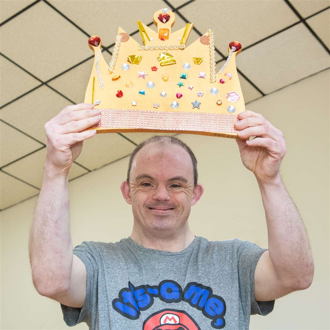 Feeling regal is Andrew Ross with his crown. Picture: Daniel Forsyth