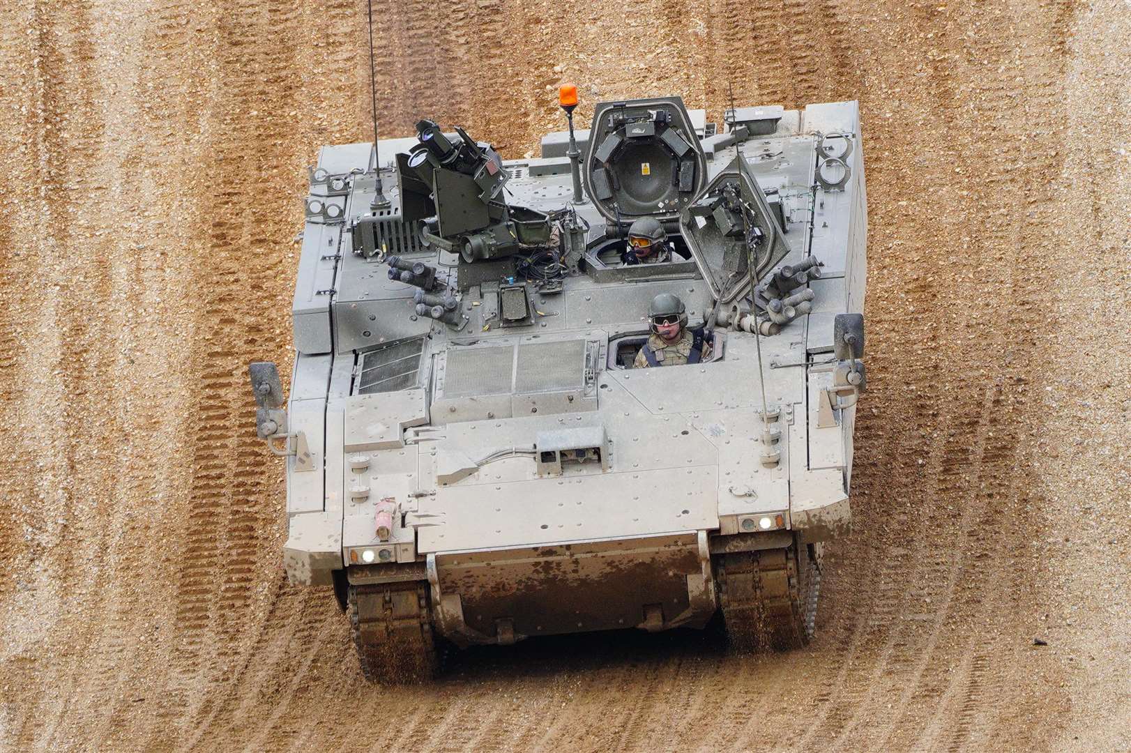 An Ajax Ares tank on the training range at Bovington Camp, a British Army military base in Dorset, during a visit by Defence Secretary Ben Wallace (Ben Birchall/PA Wire)