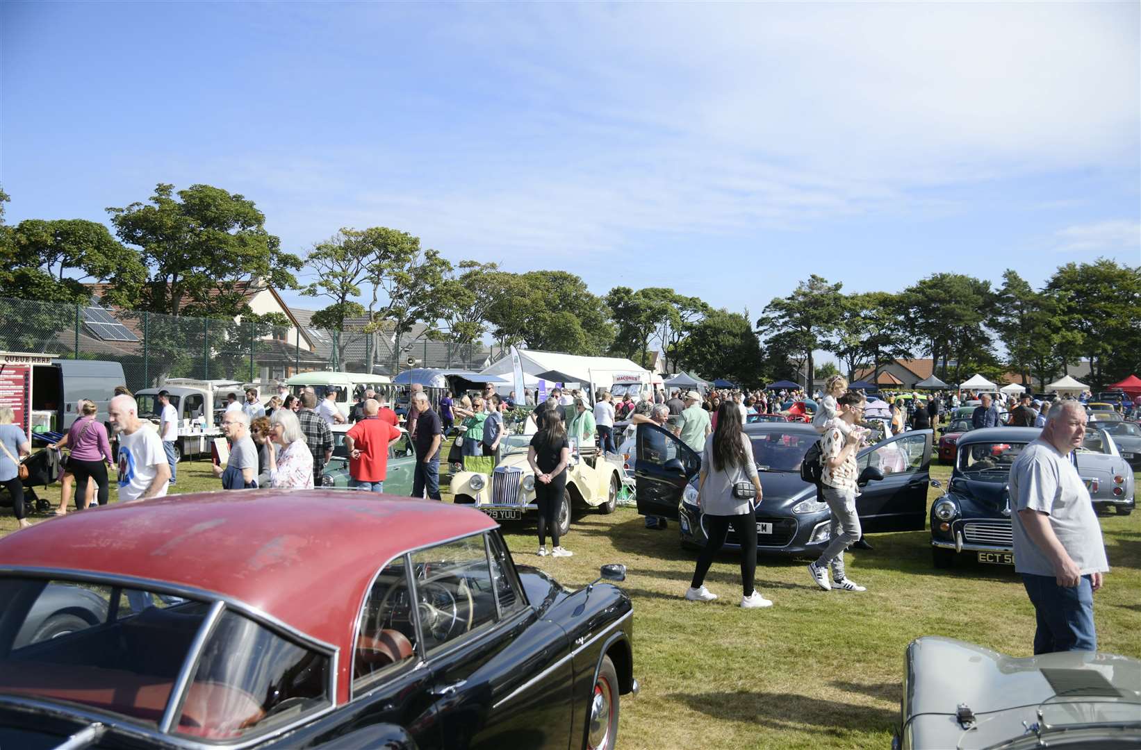The crowd enjoying the sun and the array of cars on show...2022 Buckie Classic Car Show. ..Picture: Beth Taylor.