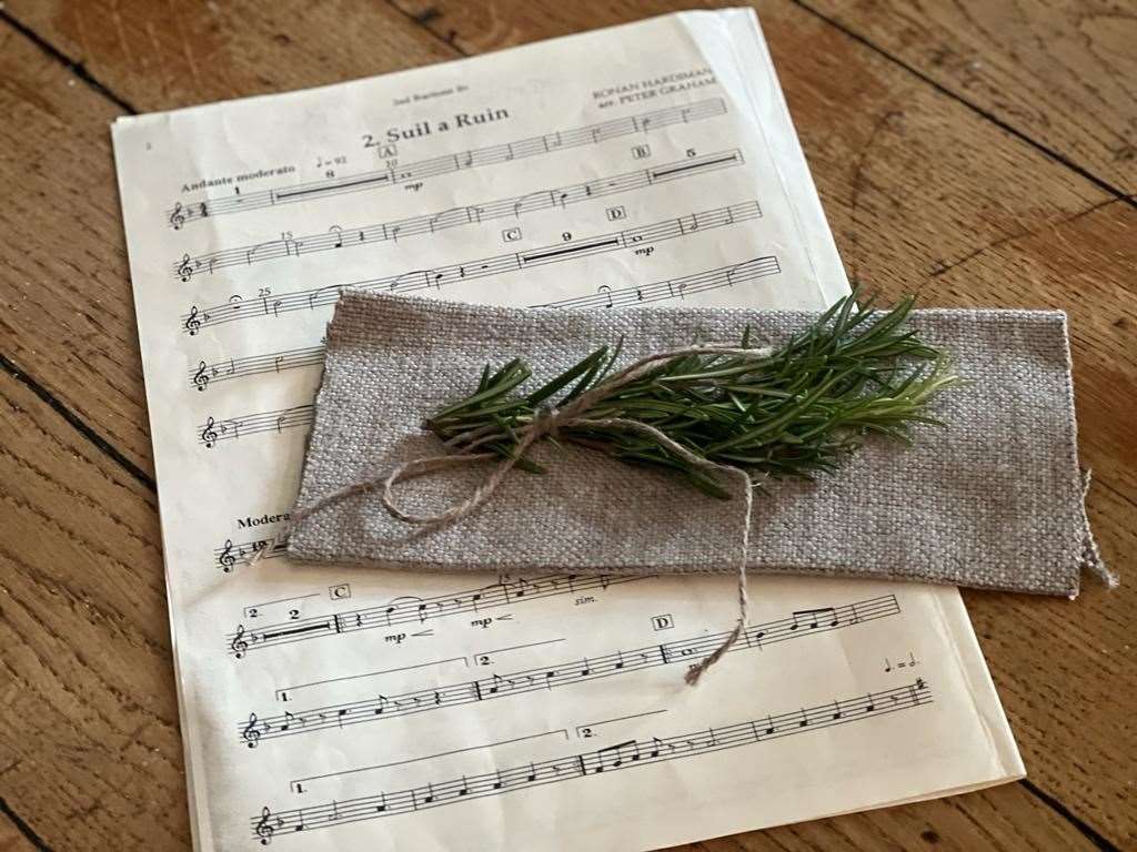 A sprig of rosemary, which signifies remembrance, was given to guests attending the event at Belfast City Hall (Belfast City Council/PA)