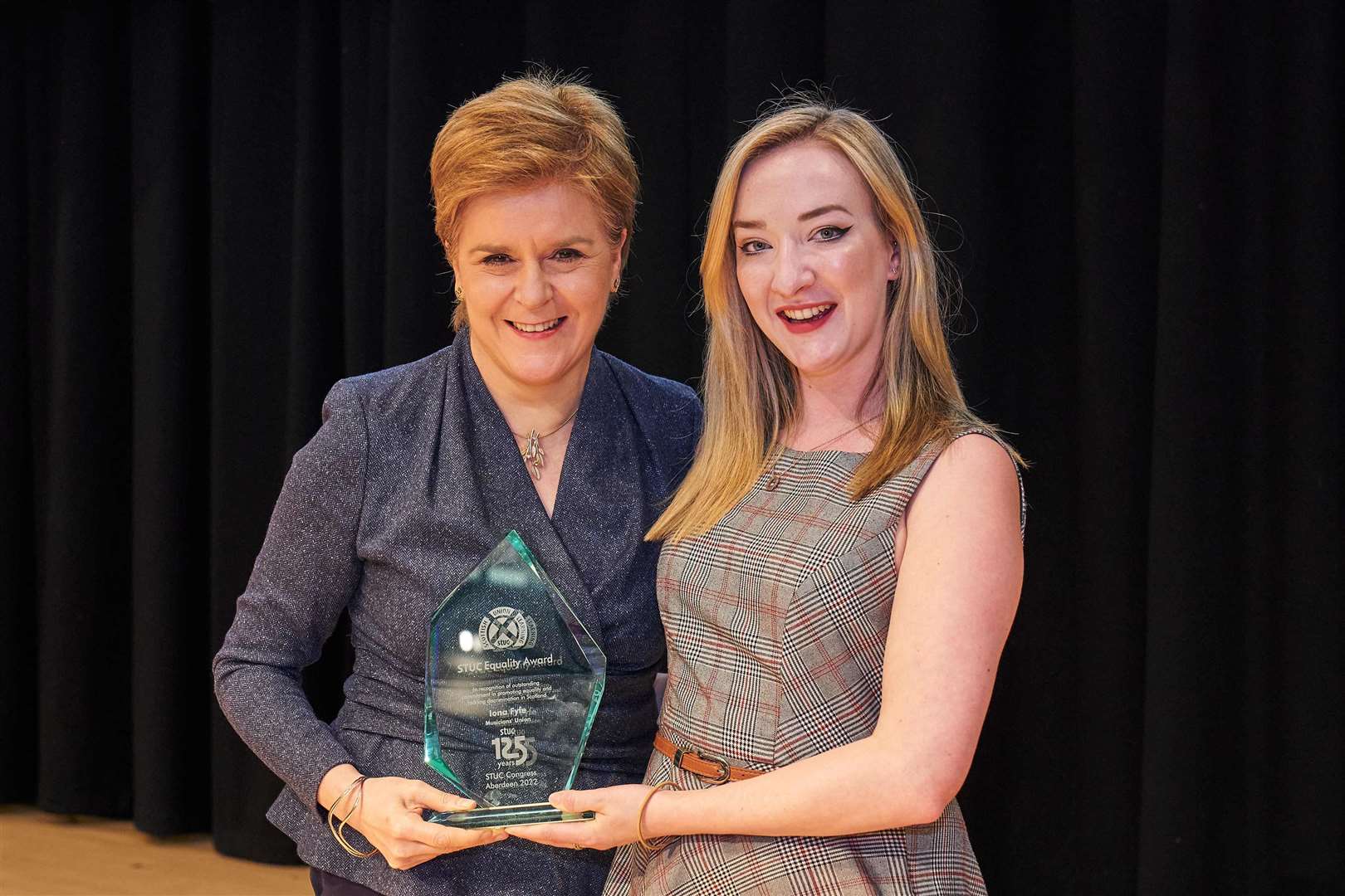 Huntly's Iona Fyfe receives the STUC award from First Minster Nicola Sturgeon. Picture: Fraser Brand