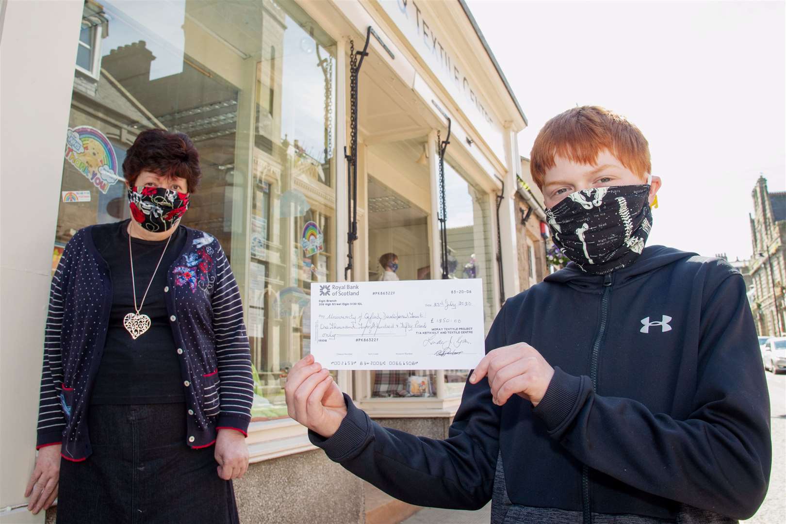 Alistair McKillop and Linda Gorn with a cheque for Â£1250 for the University of Oxford Development Trust following months of work in making facemasks for the pandemic...Picture: Daniel Forsyth..