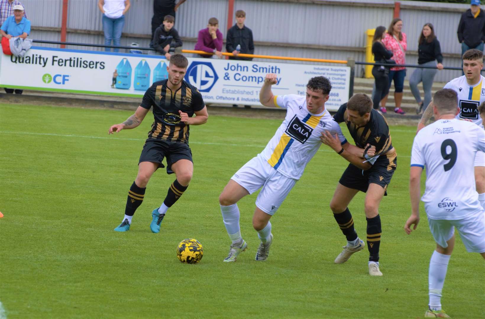 Michael Clark gets to grips. Huntly v Inverurie Locos. Picture: Derek Lowe