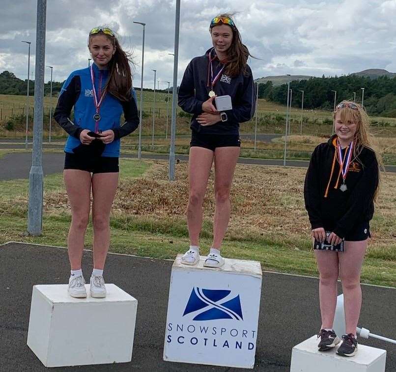 Elspeth Cruickshank top of the podium and Sophie Forth in position 2 at a national rollerski event. Photo:Roy Young.