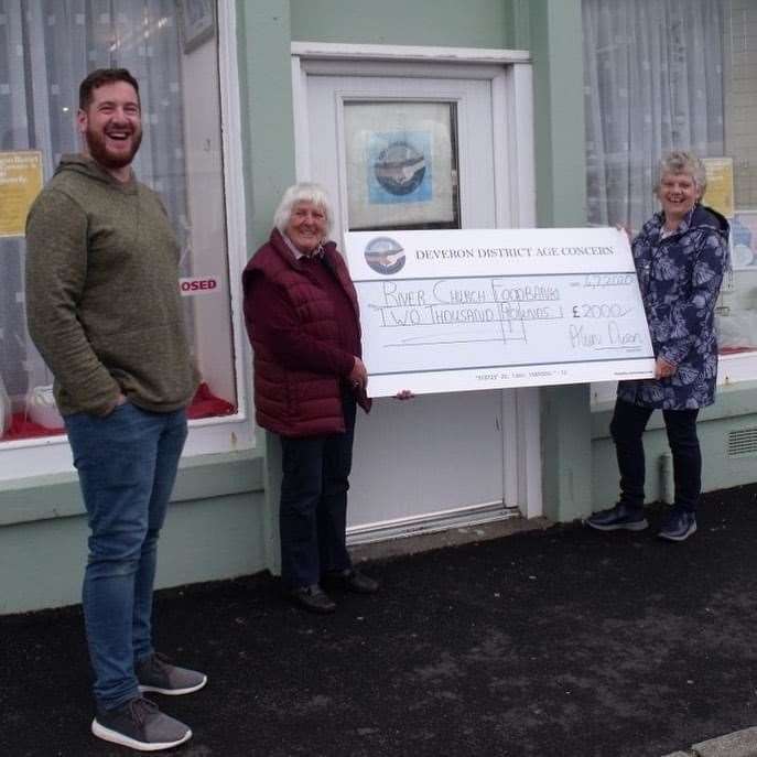 Deveron District Age Concern's Shona Sopel (right) presents the donation to Pastor Rob McArthur and Mary Kitchen who help organise the River Church food bank.
