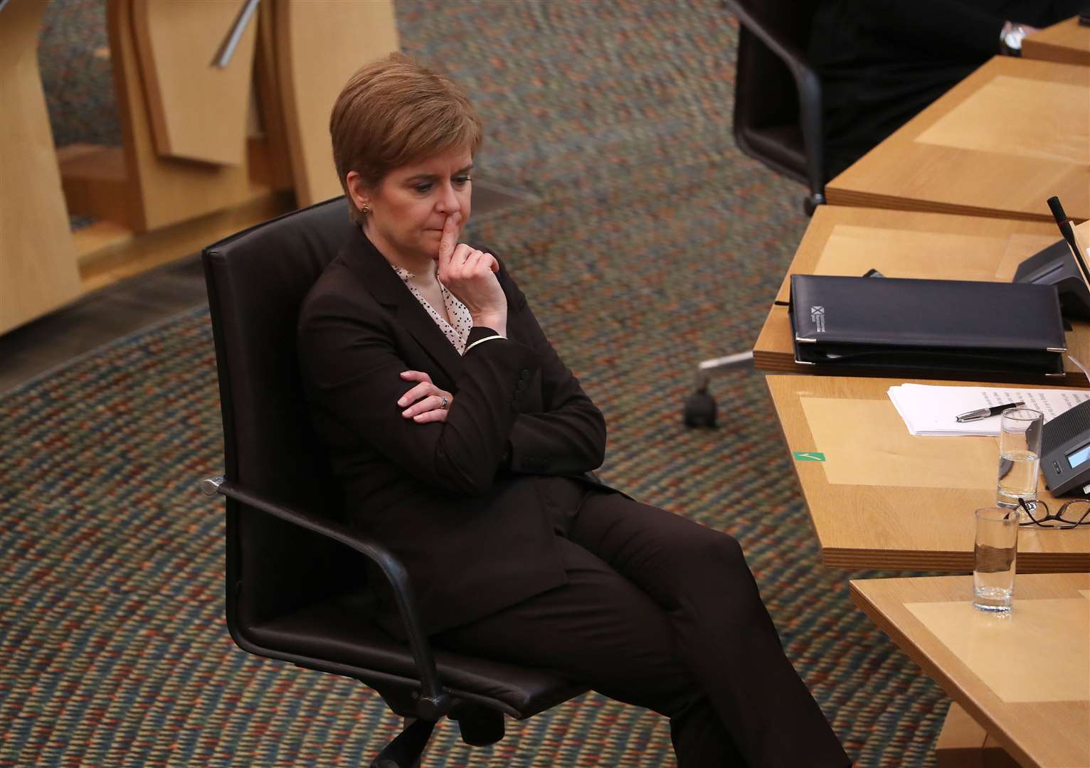 First Minister Nicola Sturgeon in the Scottish Parliament after her statement outlining further coronavirus restrictions (Andrew Milligan/PA)