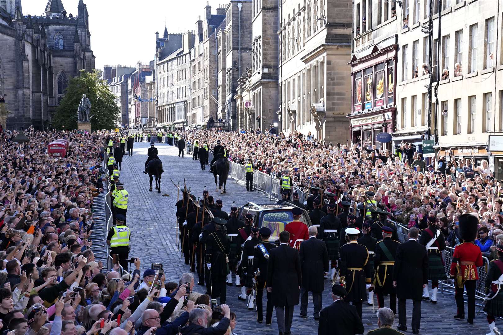 The procession of the Queen’s coffin from the Palace of Holyroodhouse to St Giles’ Cathedral (Jon Super/PA)