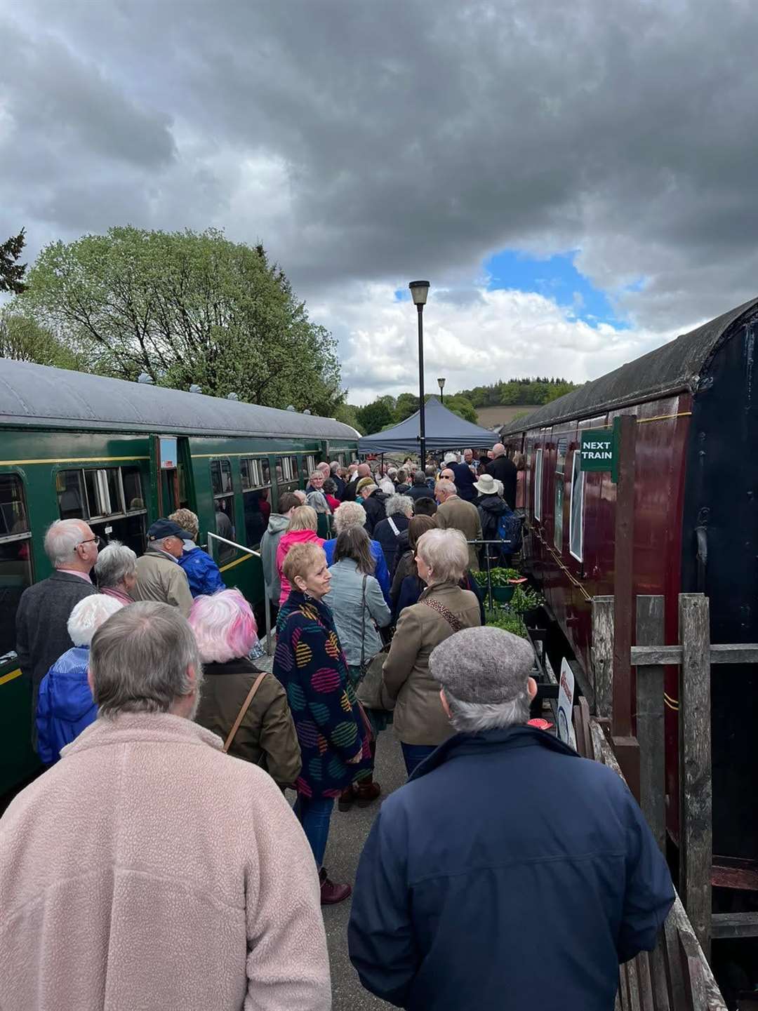 A large crowd at the Dufftown railway station.