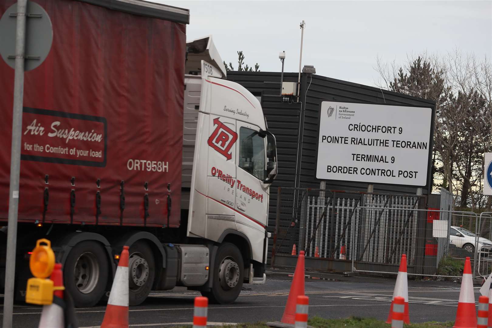 A freight truck passes the Border Control post in Dublin Port (Brian Lawless/PA)
