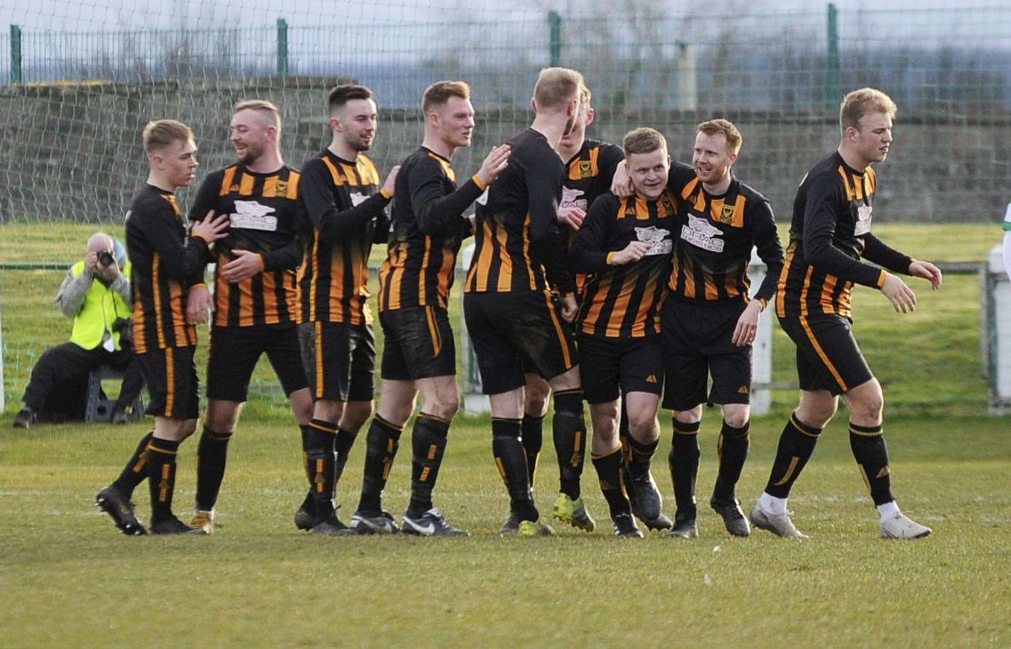 Celebration time for the Huntly team at Buckie. Picture: Eric Cormack.