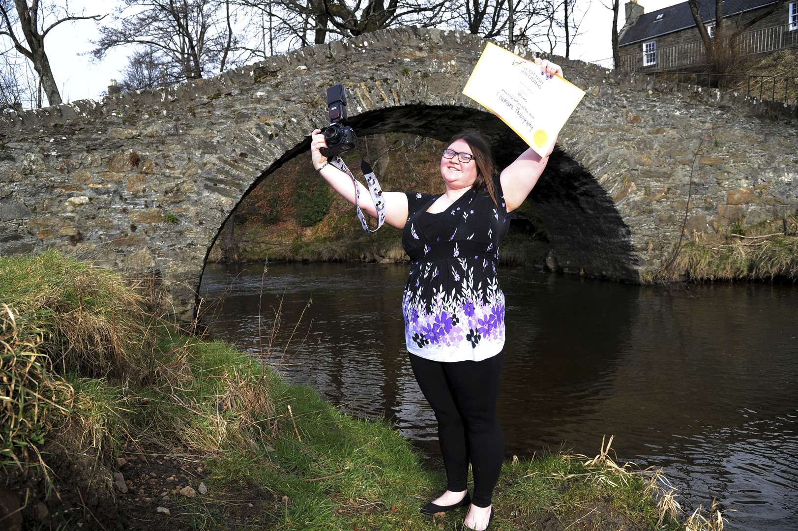 Morag Martin, from Keith, won Scottish Wedding Photographer of the Year award. She is pictured here beside the historic Auld Brig in the town, where she does a lot of her work. Picture: Eric Cormack