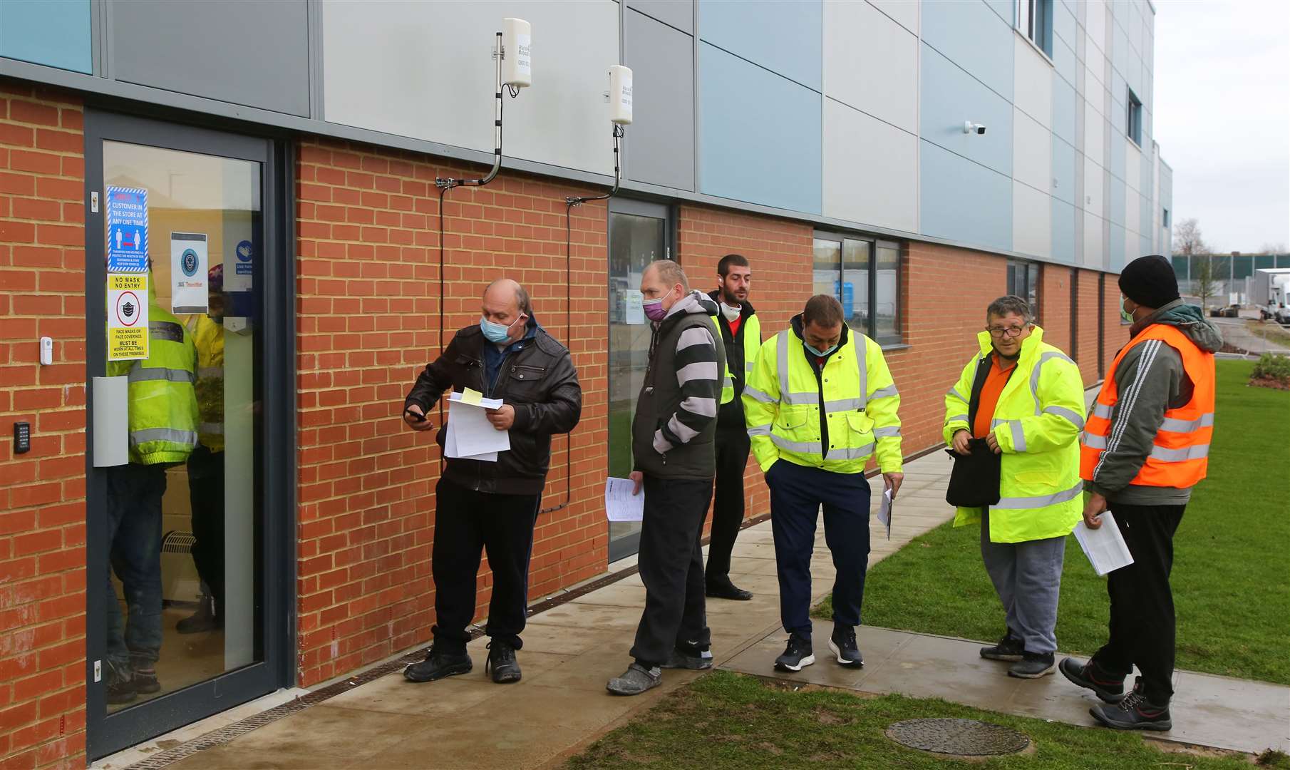 Lorry drivers queue to have their paperwork processed at a customs facility in Ashford, Kent (Gareth Fuller/PA)