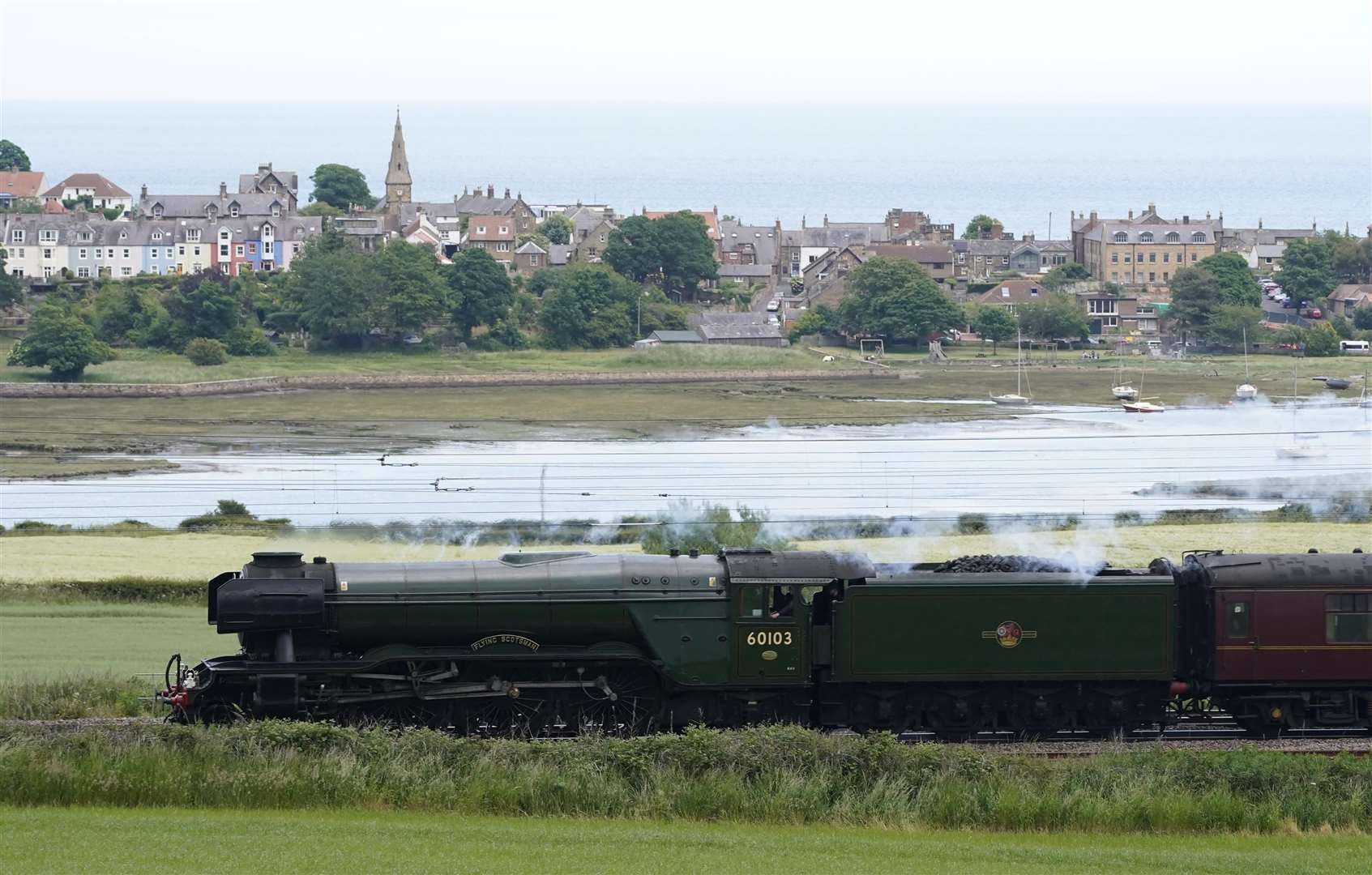 Flying Scotsman passes Alnmouth in Northumberland (Owen Humphreys/PA)