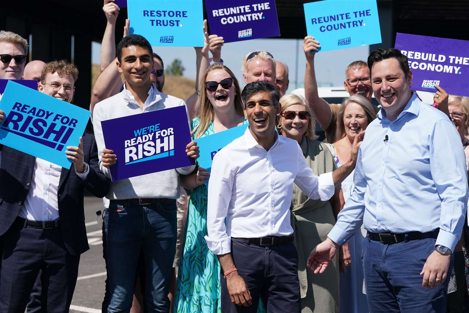 Rishi Sunak with Tees Valley Mayor Ben Houchen and supporters during a visit to Teesside Freeport as part of his campaign to become the next prime minister (Owen Humphreys/PA)