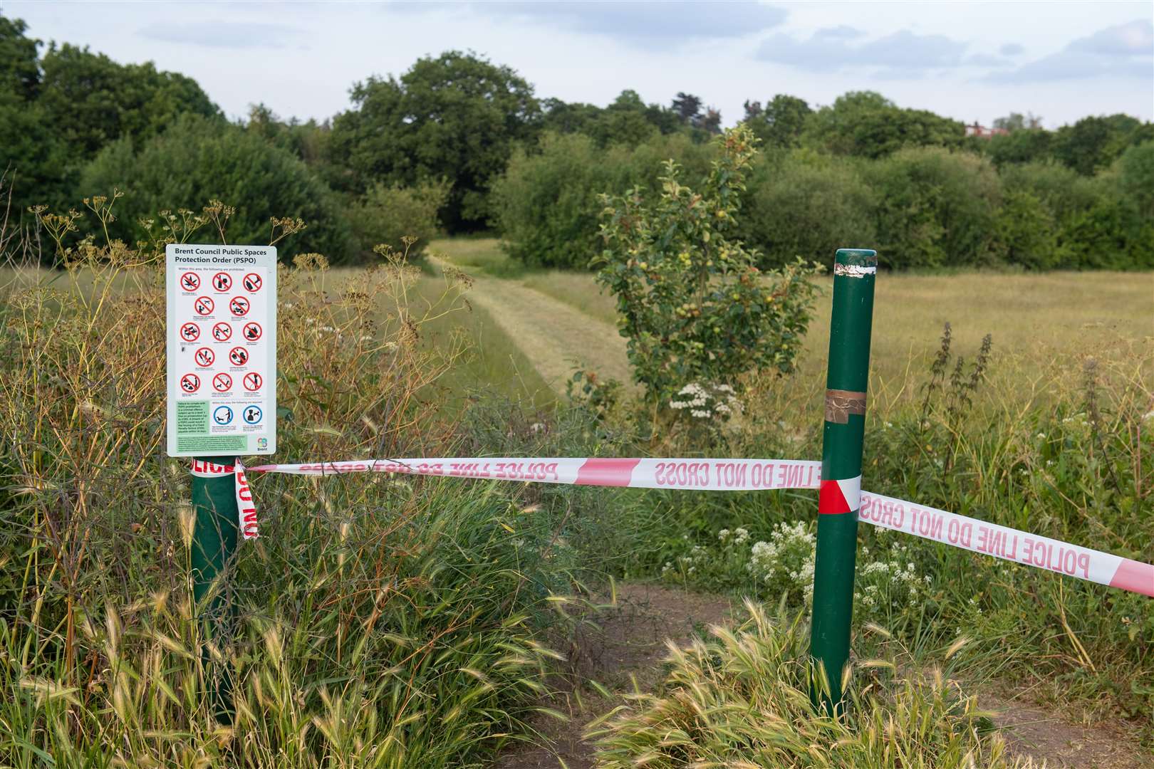 A police cordon at an entrance to Fryent Country Park, in Wembley, where Bibaa Henry and Nicole Smallman were murdered (Dominic Lipinski/PA)