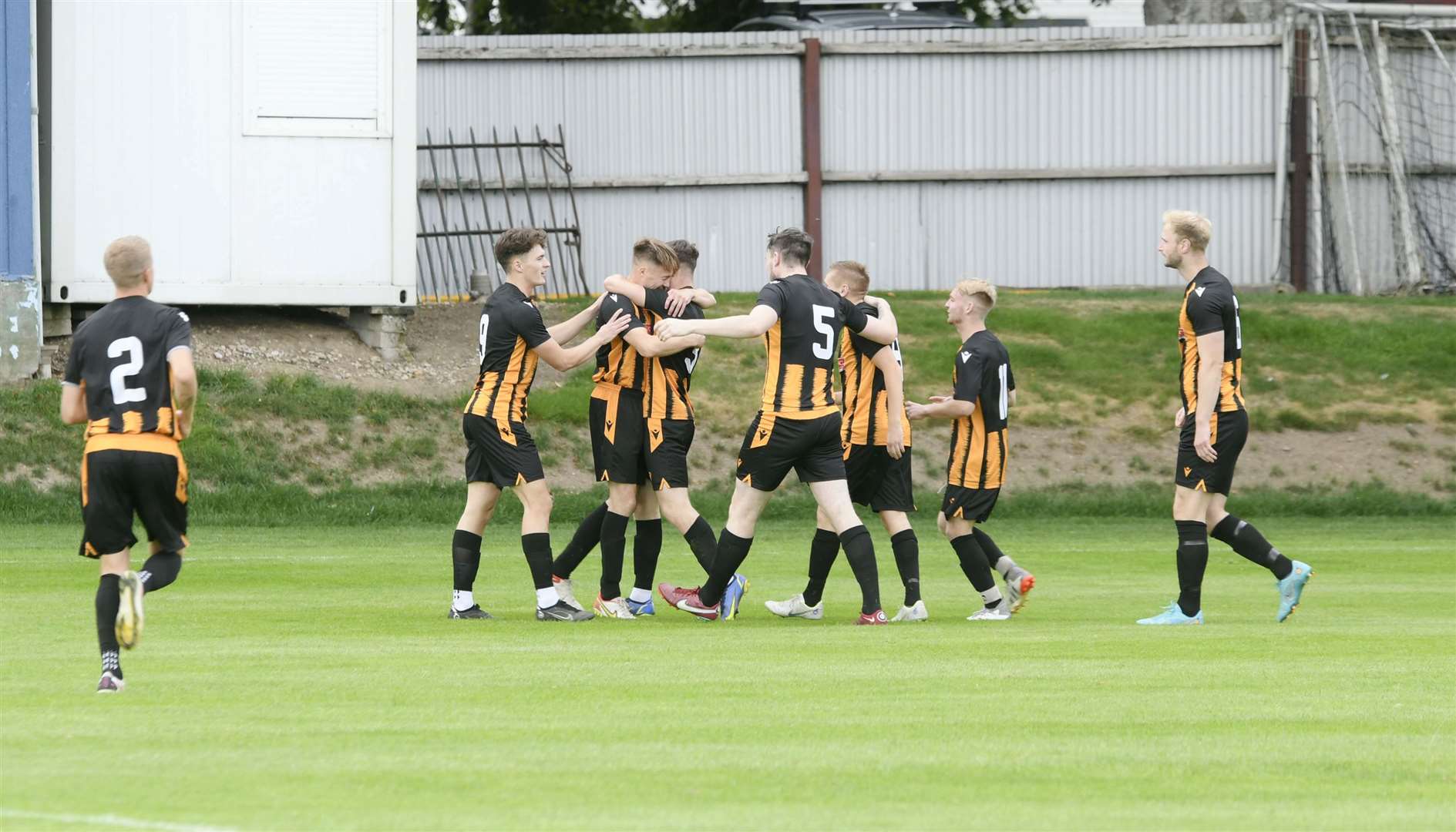 Huntly celebrating after Gavin Elphinstone scored the only goal of the game. Picture: Beth Taylor.