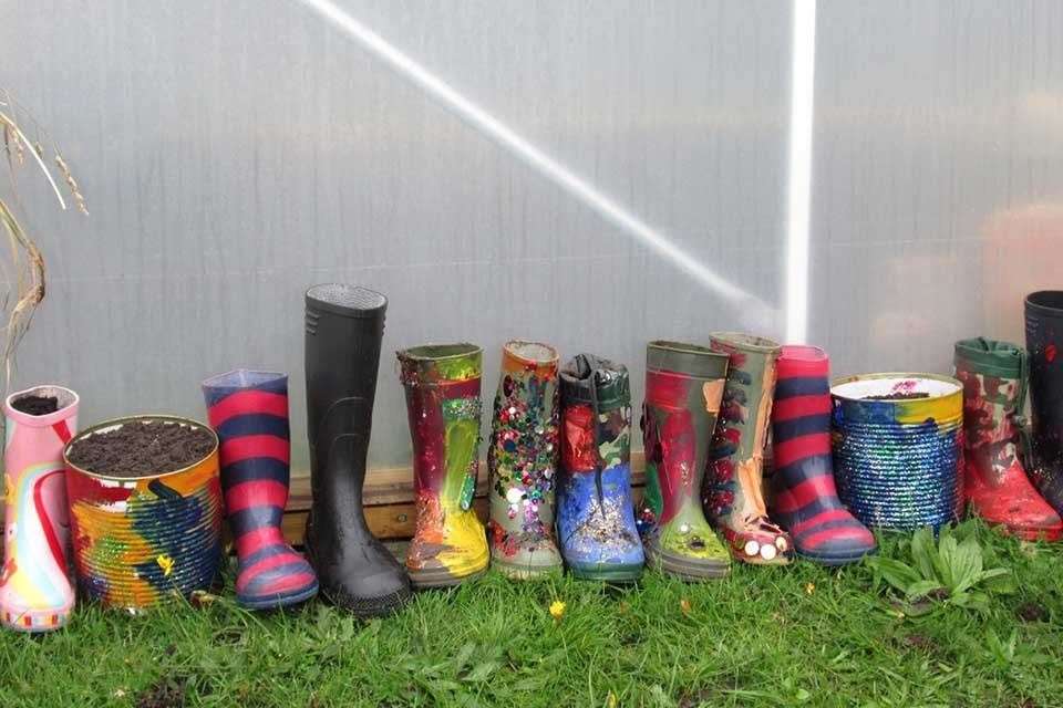 Craft ideas include painting old Wellie boots to make colourful planters.