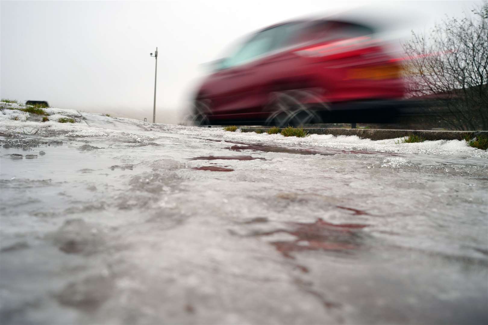 Main roads are more likely to have been gritted (PA)