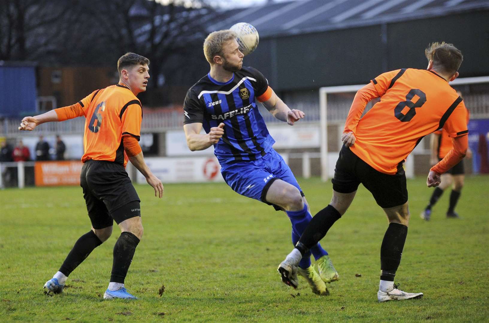 Huntly captain Ross Still battles for the ball at Rothes. Picture: Eric Cormack.