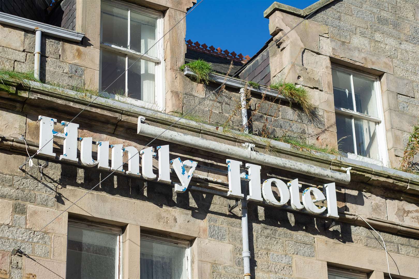 Weeds and cracked stonework on the Huntly Hotel. Picture: Daniel Forsyth.