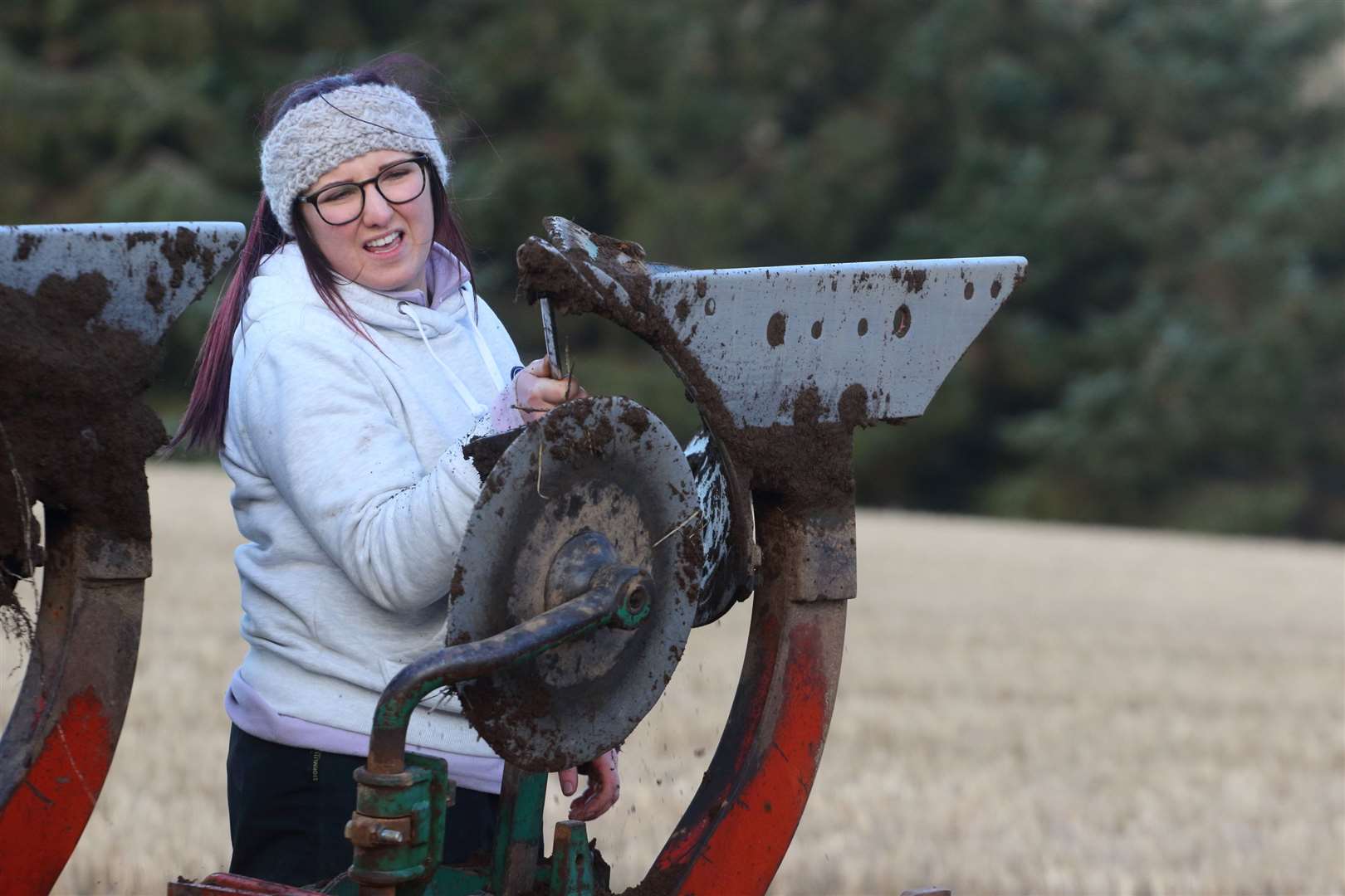 Katie McDonald makes some adjustments to the plough. Picture: David Porter