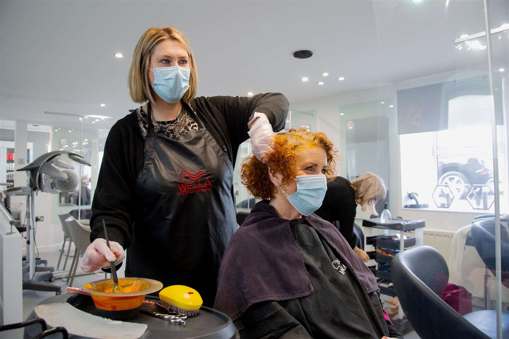 Cardiac nurse Mandy Davies gets some TLC for her hair from Alison Milton of Weir Hairdressing. Picture: Daniel Forsyth