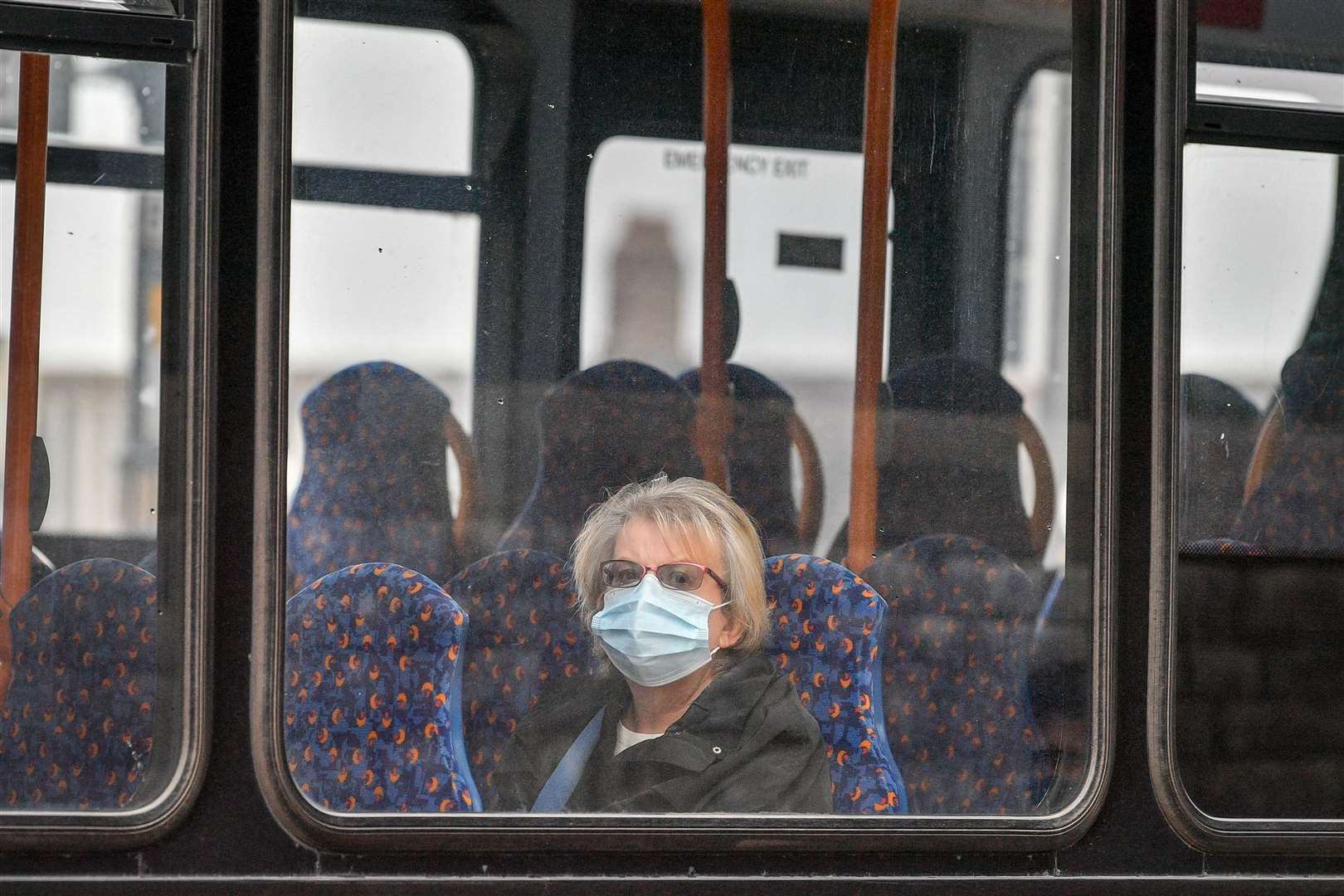 A passenger aboard a bus in Cardiff – not one passenger has been fined in Wales for flouting rules on public transport (Ben Birchall/PA)