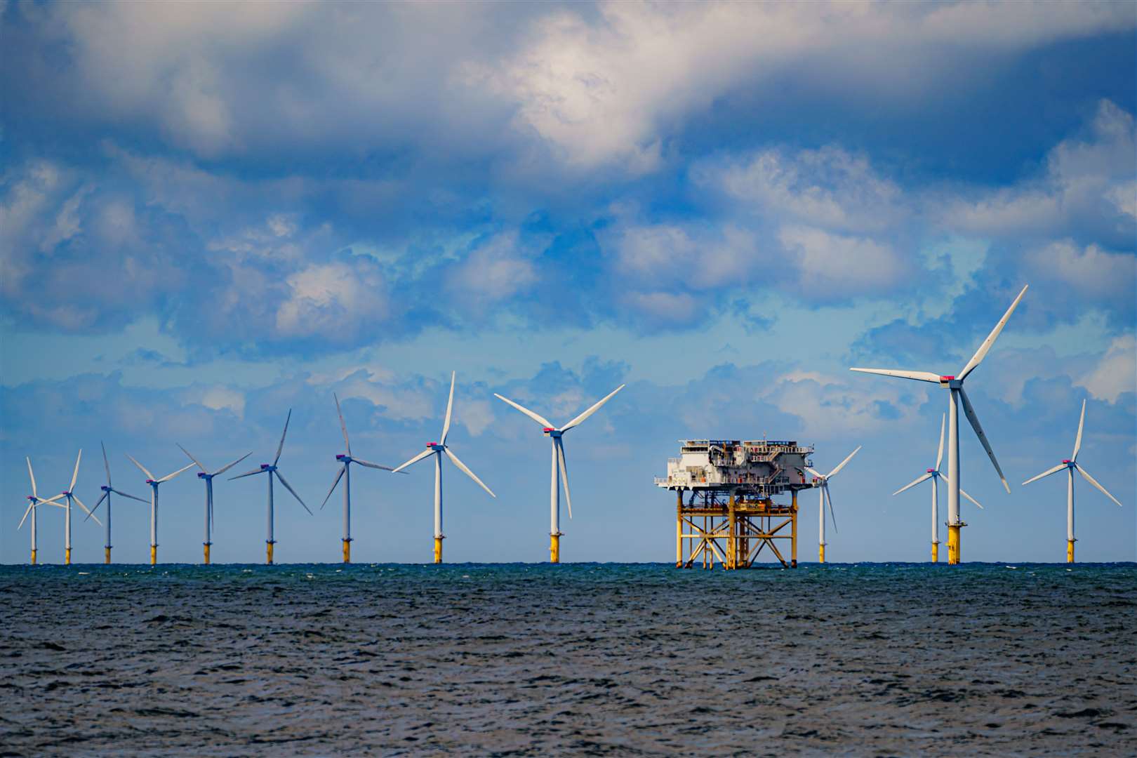 Offshore wind has expanded as fossil fuels have declined (Ben Birchall/PA)
