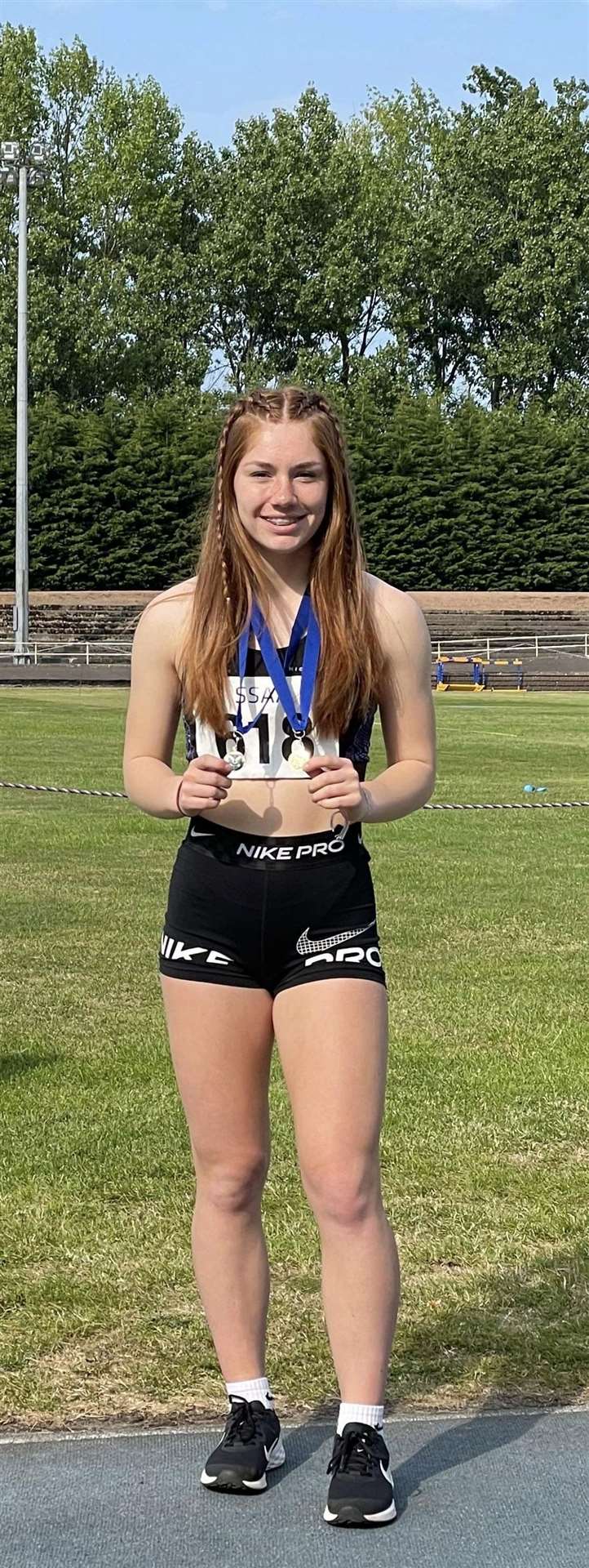Two track and field golds for Holly Whittaker (Elgin High).