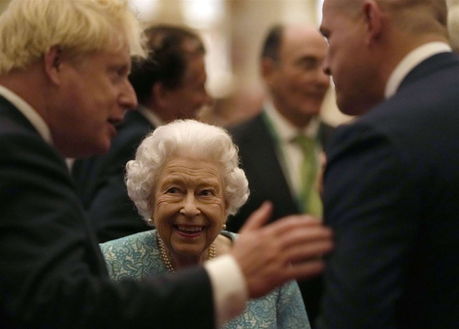 The Queen with Prime Minister Boris Johnson during a reception for delegates of the Global Investment Conference at Windsor Castle on Tuesday (Alastair Grant/PA)