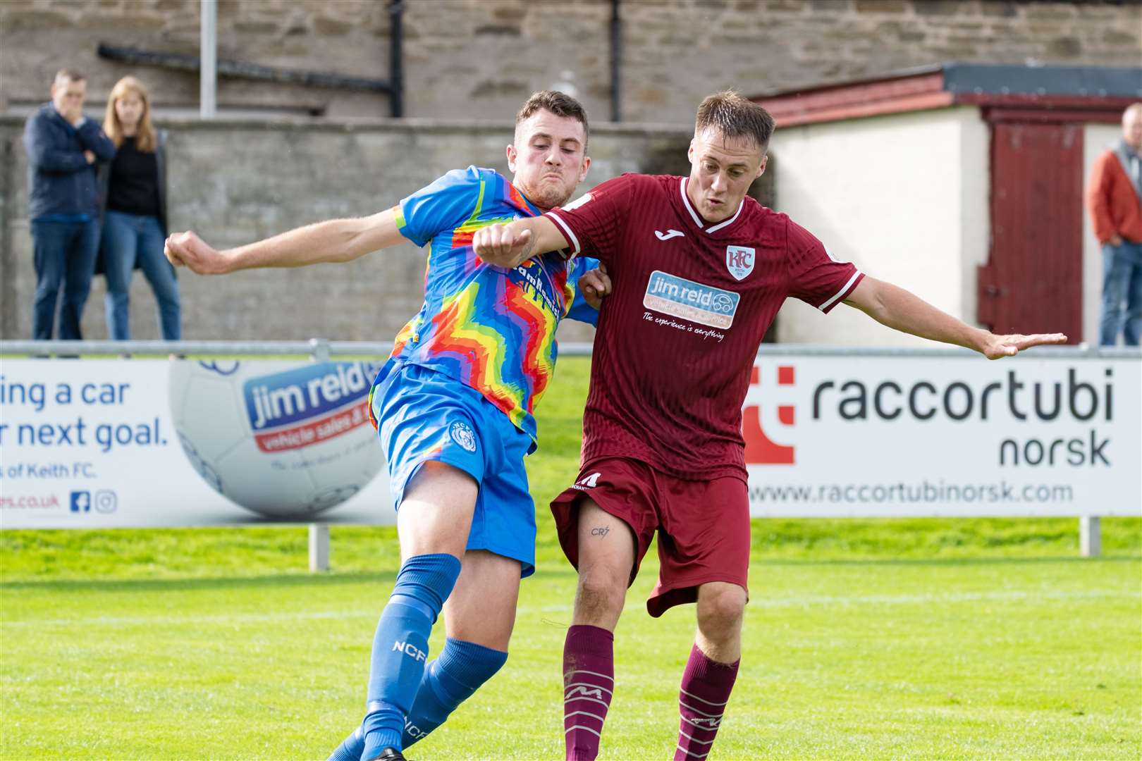 Keith's Gavin Elphinstone and Nairn's Angus Dey keep their eyes on the ball. ..Keith F.C. (3) v Nairn County F.C. (2), Highland Football League at Kynoch Park. ..Picture: Beth Taylor.