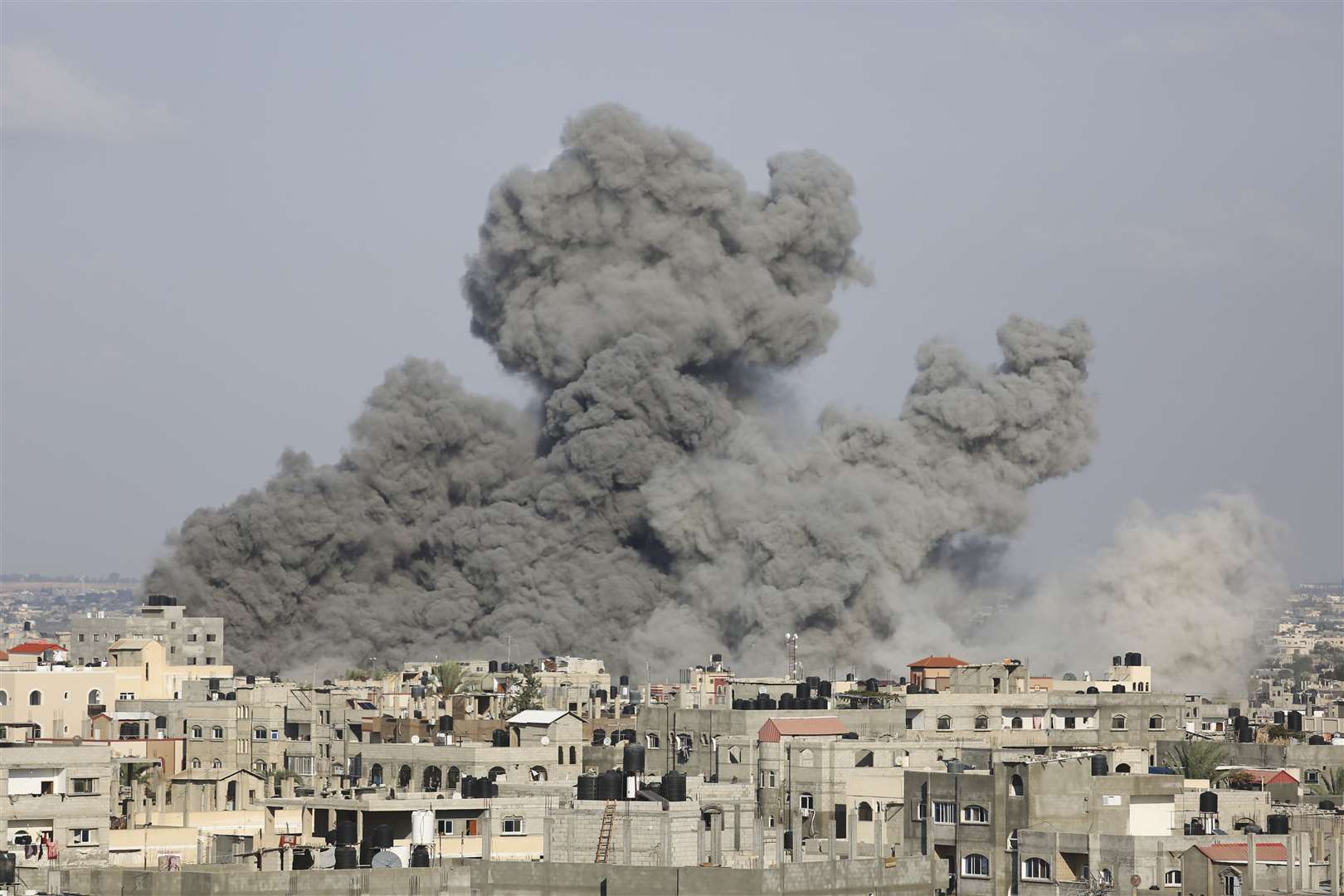 Smoke rises following Israeli airstrikes in Rafah, southern Gaza Strip, on Thursday (Hatem Ali/AP)