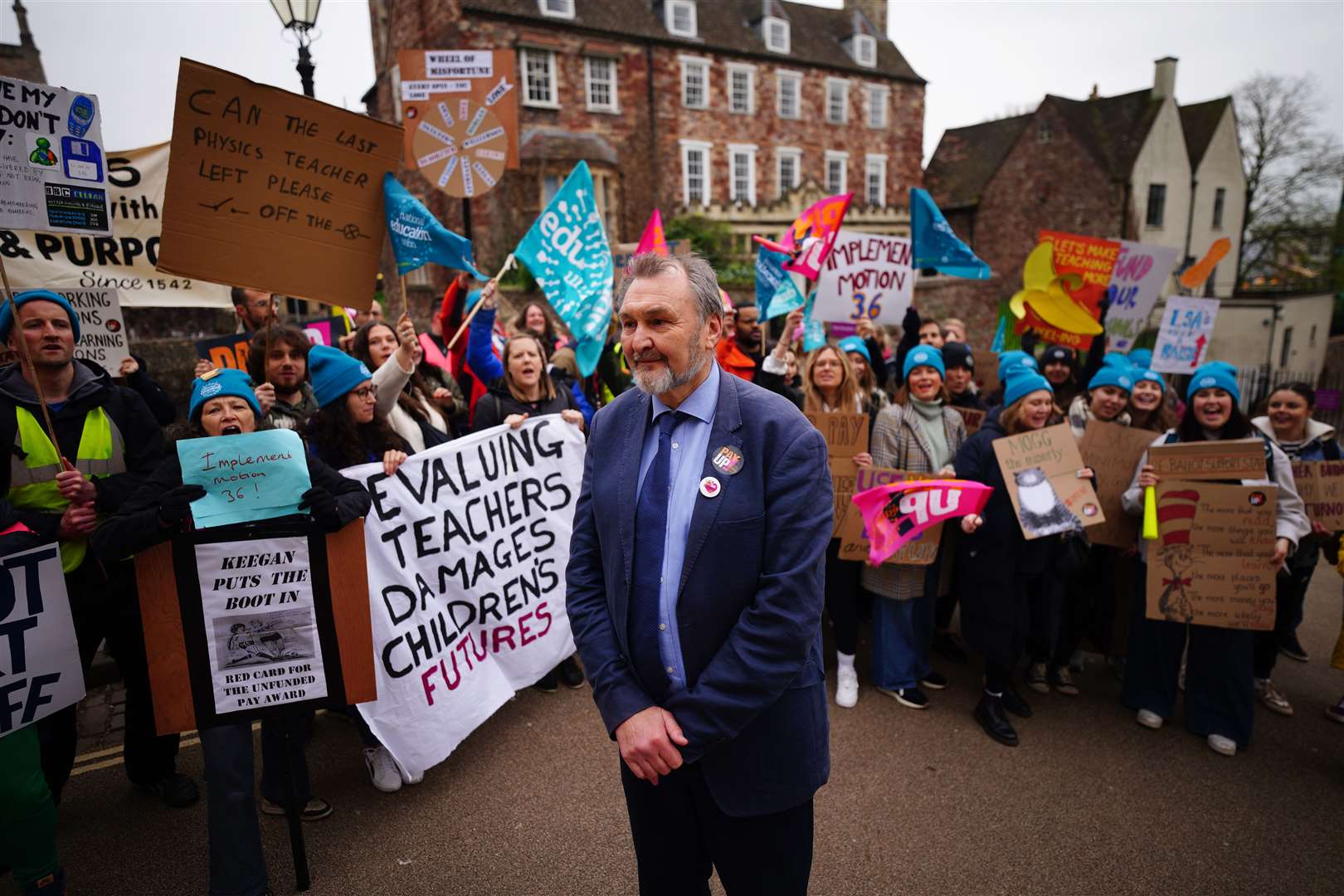 Kevin Courtney, joint general secretary of National Education Union (NEU), with teachers on the picket line outside Bristol Cathedral School, College Square, Bristol (Ben Birchall/PA)