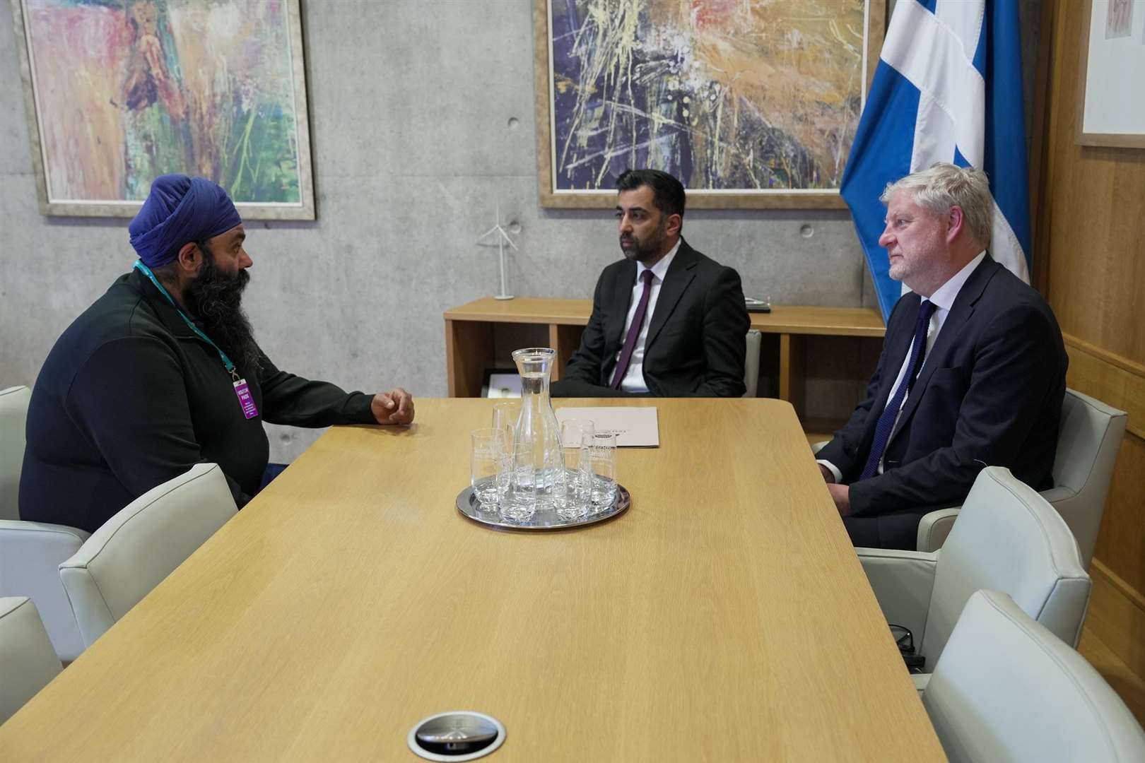 Scotland’s First Minister Humza Yousaf meets with Gurpreet Singh Johal, brother of Jagtar Singh Johal, at the Scottish Parliament on Tuesday afternoon (Scottish Government/PA)