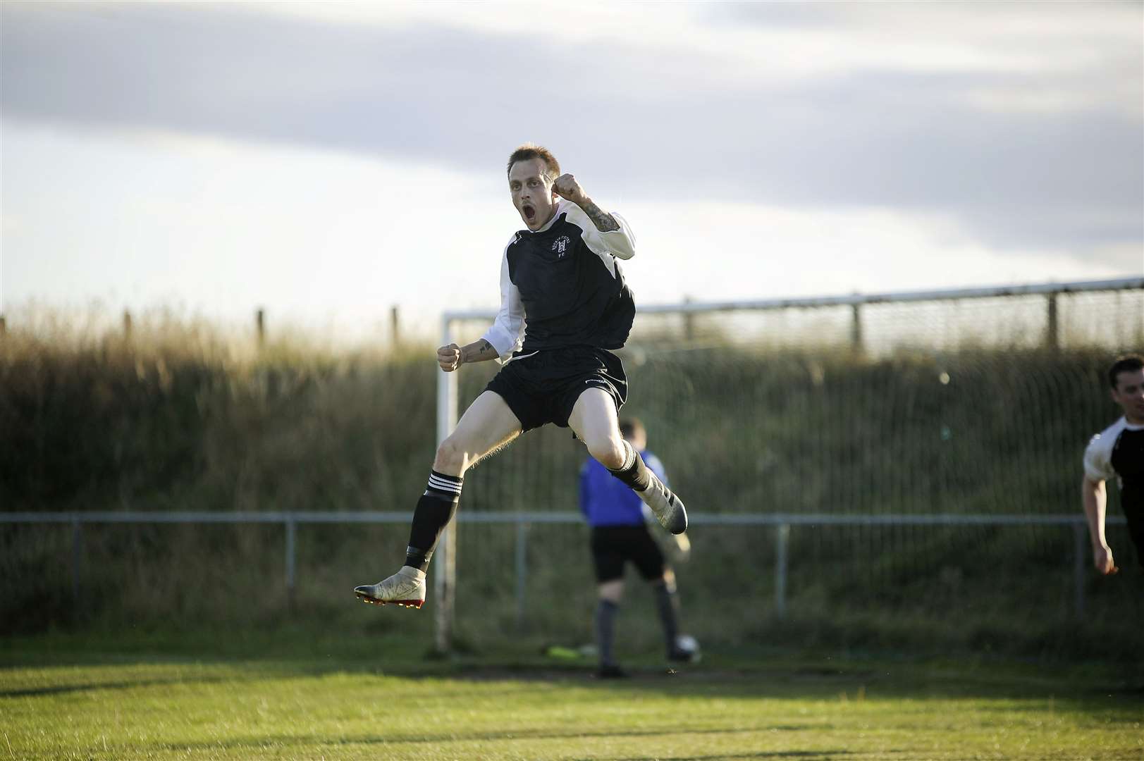 Paul Mellon jumps for joy after netting Buckie United's opening goal..Picture: Becky Saunderson..