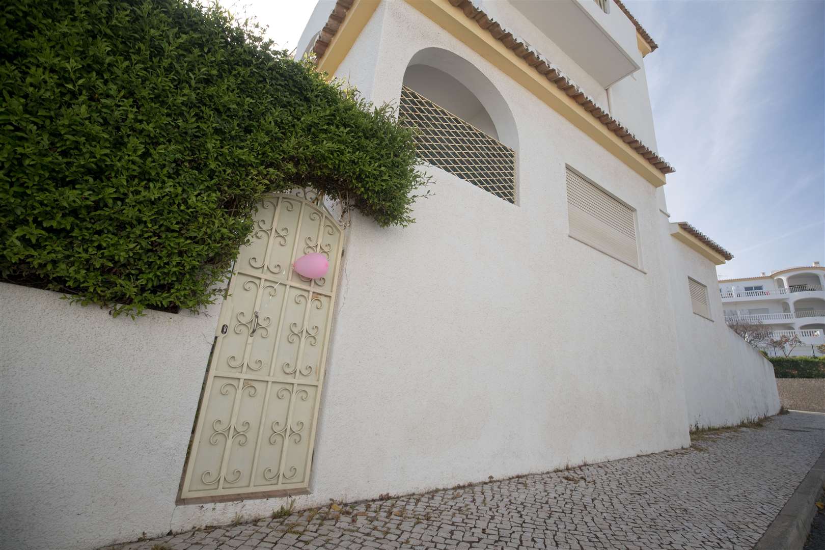 A pink balloon outside apartment 5A on Rua Dr Agostinho da Silva in Praia Da Luz, Portugal, where Madeline McCann went missing in 2007 (Steve Parsons/PA)