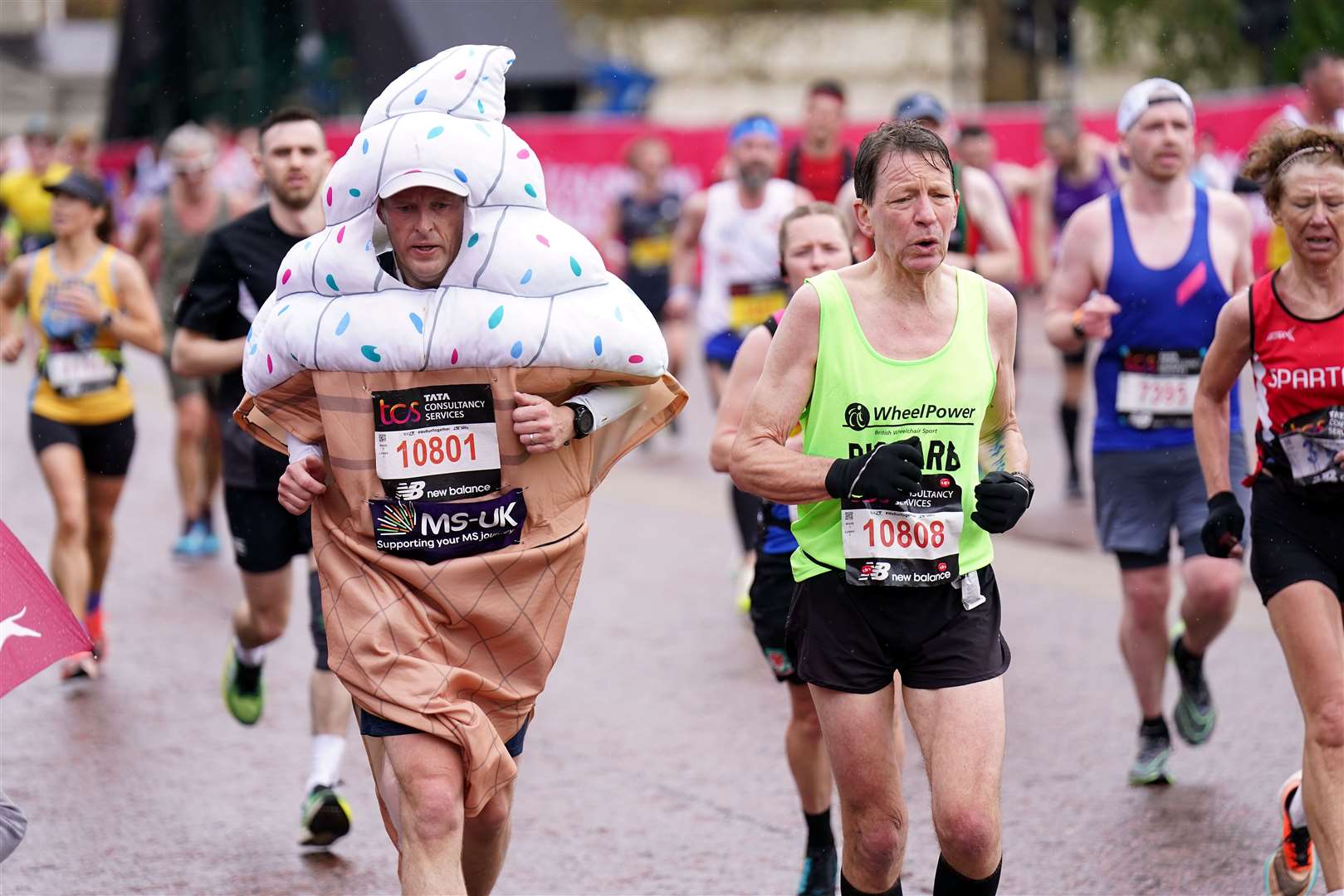 The fancy dress outfits worn by some runners always entertain spectators at the London Marathon (James Manning/PA)