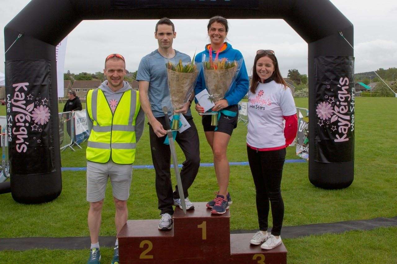Kayleigh's Wee Stars founders Jonathan (far left) and Anna Cordiner (far right), alongside the 2019 race winners Kenny O'Neill and Emma Murray.