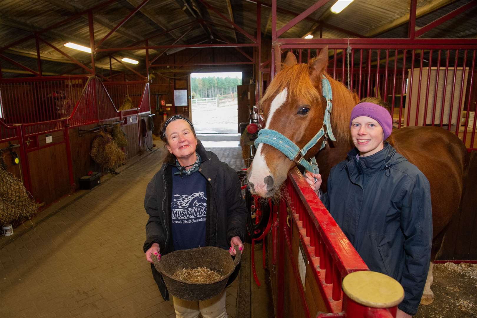Frances Davies (left) and Melanie Foley (right) with Rodney. ..Touchdown Memorial home for Horses, near Mulben...Picture: Daniel Forsyth..
