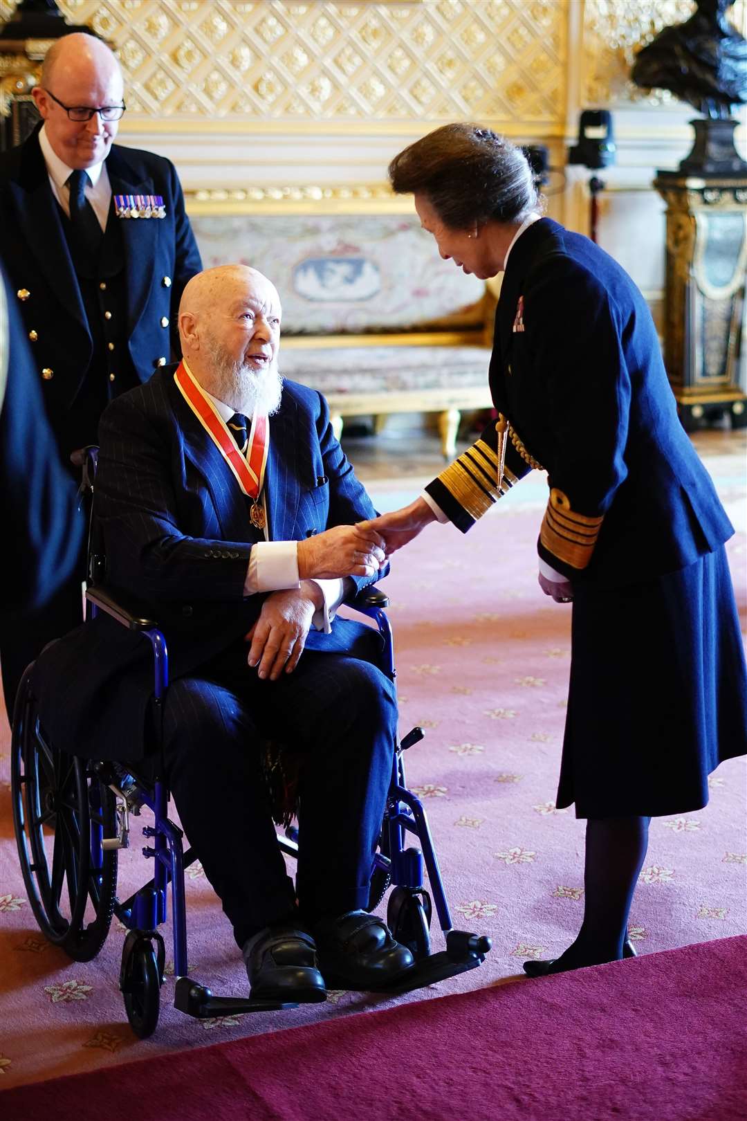 Sir Michael Eavis was honoured by the Princess Royal (Aaron Chown/PA)