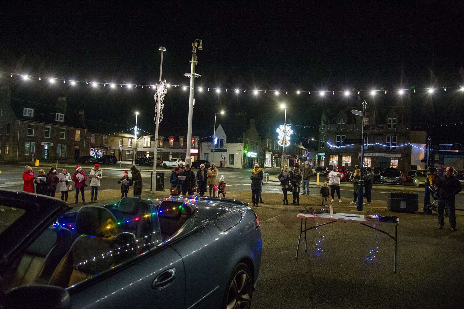 The singers bring some Christmas joy to the centre of Buckie. Picture: Becky Saunderson